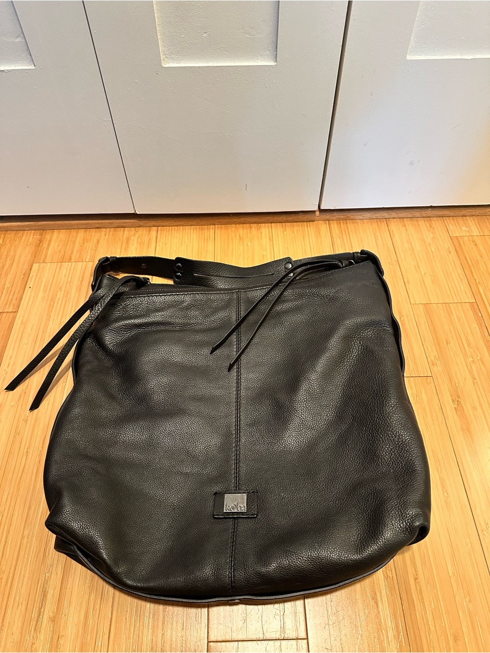 KOOBA black leather hobo bag with metal studs